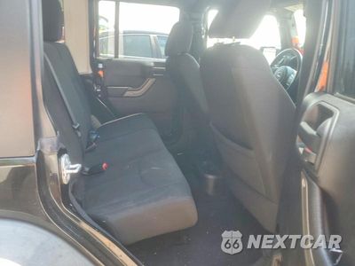Zdjęcie 10 z 12 samochodu: 2016 JEEP WRANGLER UNLIMITED SPORT VIN:1C4BJWDG3GL115667 - miniatura