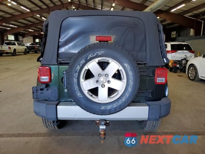 Zdjęcie 6 z 13 samochodu: 2010 JEEP WRANGLER UNLIMITED SAHARA VIN:1J4BA5H17AL167899 - miniatura