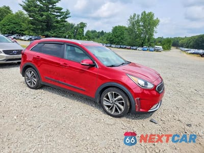 Czwarte zdjęcie samochodu z boku: 2017 KIA NIRO EX TOURING VIN:KNDCE3LC4H5049075 - miniatura