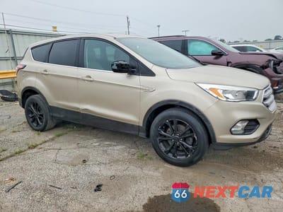 Czwarte zdjęcie samochodu z boku: 2017 FORD ESCAPE SE VIN:1FMCU0GD9HUA99637 - miniatura