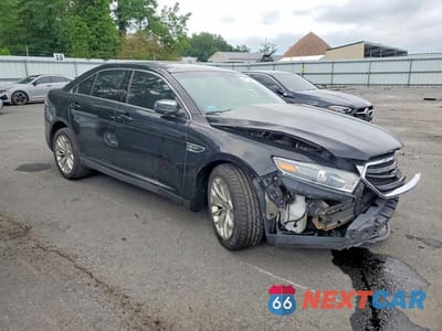 Czwarte zdjęcie samochodu z boku: 2017 FORD TAURUS LIMITED VIN:1FAHP2F81HG117683 - miniatura