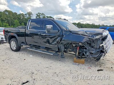 Czwarte zdjęcie samochodu z boku: 2020 GMC SIERRA K2500 DENALI VIN:1GT49REY2LF105649 - miniatura