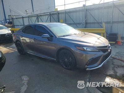 Czwarte zdjęcie samochodu z boku: 2021 TOYOTA CAMRY XSE VIN:4T1K61BK2MU041509 - miniatura