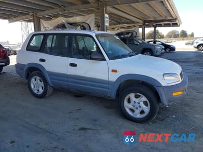 Czwarte zdjęcie samochodu z boku: 1997 TOYOTA RAV4 BASE VIN:JT3HP10V5V0118265 - miniatura