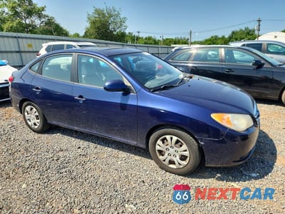 Czwarte zdjęcie samochodu z boku: 2010 HYUNDAI ELANTRA BLUE VIN:KMHDU4AD4AU148897 - miniatura