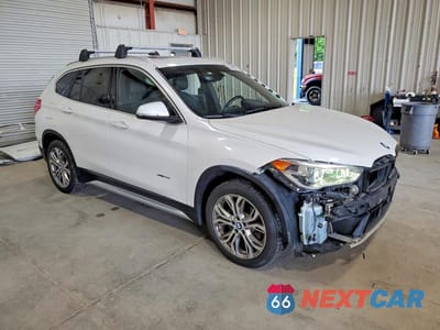 Czwarte zdjęcie samochodu z boku: 2016 BMW X1 XDRIVE28I VIN:WBXHT3C30G5E52275 - miniatura