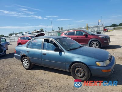 Czwarte zdjęcie samochodu z boku: 1994 TOYOTA COROLLA DX VIN:1NXAE09B0RZ209895 - miniatura