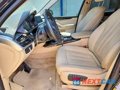 Zdjęcie 7 z 13 samochodu: 2014 BMW X5 XDRIVE35I VIN:5UXKR0C5XE0K47361 - miniatura