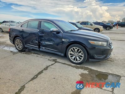 Czwarte zdjęcie samochodu z boku: 2014 FORD TAURUS LIMITED VIN:1FAHP2F87EG115674 - miniatura