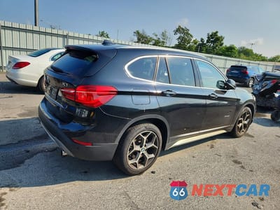 Trzecie zdjęcie samochodu z tyłu: 2016 BMW X1 XDRIVE28I VIN:WBXHT3C33G5E47698 - miniatura