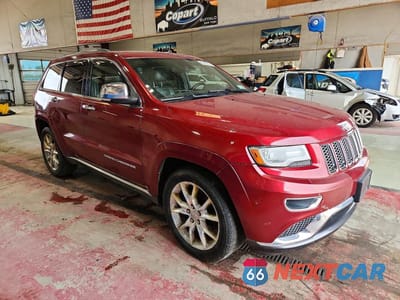 Czwarte zdjęcie samochodu z boku: 2014 JEEP GRAND CHEROKEE SUMMIT VIN:1C4RJFJT4EC407938 - miniatura