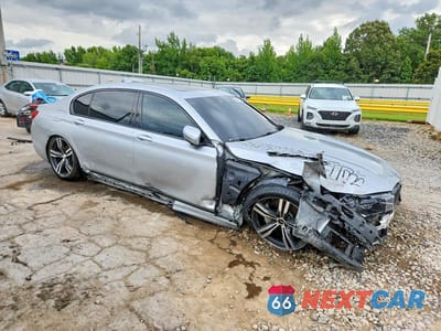 Czwarte zdjęcie samochodu z boku: 2019 BMW 740 I VIN:WBA7E2C50KB454272 - miniatura