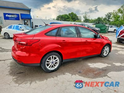 Trzecie zdjęcie samochodu z tyłu: 2016 FORD FOCUS SE VIN:1FADP3F25GL325362 - miniatura