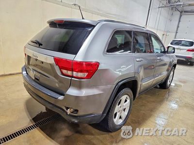Trzecie zdjęcie samochodu z tyłu: 2012 JEEP GRAND CHEROKEE LAREDO VIN:1C4RJFAGXCC181582 - miniatura