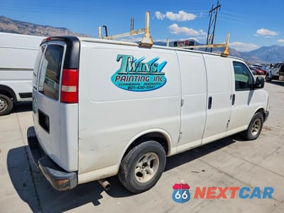 Trzecie zdjęcie samochodu z tyłu: 2014 CHEVROLET EXPRESS G1500 VIN:1GCSGAFX0E1107825 - miniatura