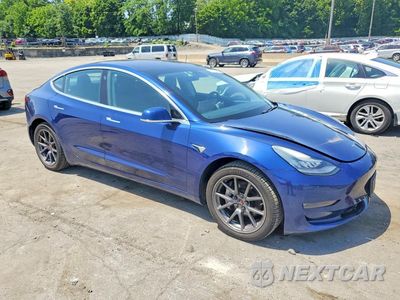 Czwarte zdjęcie samochodu z boku: 2018 TESLA MODEL 3 VIN:5YJ3E1EA2JF077994 - miniatura
