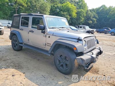 Czwarte zdjęcie samochodu z boku: 2016 JEEP WRANGLER UNLIMITED SPORT VIN:1C4BJWDG3GL315481 - miniatura