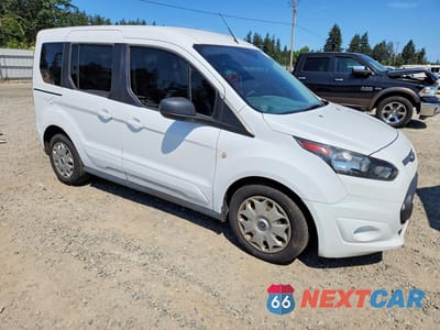 Czwarte zdjęcie samochodu z boku: 2015 FORD TRANSIT CONNECT XLT VIN:NM0AE8FX4F1202137 - miniatura