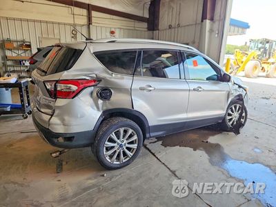 Trzecie zdjęcie samochodu z tyłu: 2017 FORD ESCAPE TITANIUM VIN:1FMCU9JD2HUD16958 - miniatura