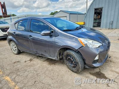 Czwarte zdjęcie samochodu z boku: 2014 TOYOTA PRIUS C THREE VIN:JTDKDTB35E1073436 - miniatura
