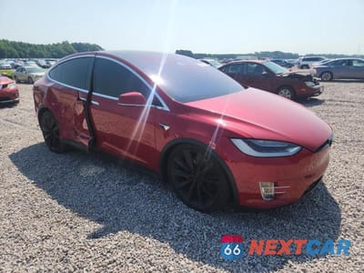 Czwarte zdjęcie samochodu z boku: 2017 TESLA MODEL X VIN:5YJXCBE48HF025027 - miniatura