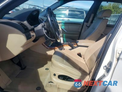 Zdjęcie 7 z 13 samochodu: 2002 BMW X5 4.4I VIN:5UXFB33532LH35619 - miniatura