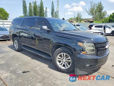 Czwarte zdjęcie samochodu z boku: 2019 CHEVROLET SUBURBAN C1500 PREMIER VIN:1GNSCJKC1KR306675 - miniatura