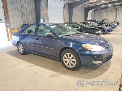 Czwarte zdjęcie samochodu z boku: 2003 TOYOTA CAMRY XLE VIN:4T1BE30KX3U173837 - miniatura