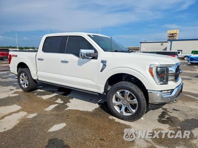 Czwarte zdjęcie samochodu z boku: 2022 FORD F150 SUPERCREW VIN:1FTFW1E80NFA04681 - miniatura