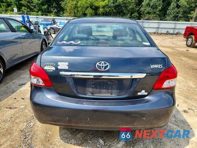 Zdjęcie 6 z 12 samochodu: 2009 TOYOTA YARIS BASE VIN:JTDBT903391335680 - miniatura