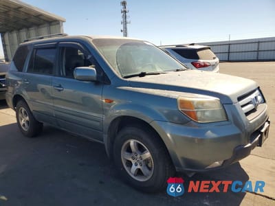 Czwarte zdjęcie samochodu z boku: 2006 HONDA PILOT EX VIN:2HKYF18696H544685 - miniatura