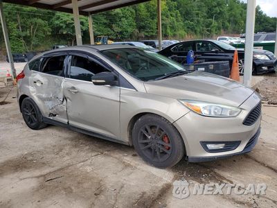 Czwarte zdjęcie samochodu z boku: 2015 FORD FOCUS TITANIUM VIN:1FADP3N24FL227746 - miniatura