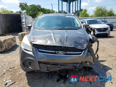Piąte zdjęcie samochodu w środku: 2016 FORD ESCAPE TITANIUM VIN:1FMCU9JX0GUA11256 - miniatura