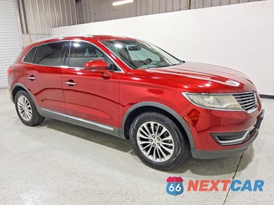 Czwarte zdjęcie samochodu z boku: 2016 LINCOLN MKX SELECT VIN:2LMPJ6KR7GBL55444 - miniatura
