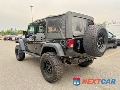 Trzecie zdjęcie samochodu z tyłu: 2016 JEEP WRANGLER UNLIMITED SPORT VIN:1C4BJWDG9GL106844 - miniatura