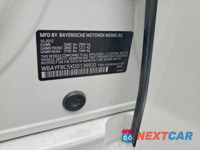 Zdjęcie 13 z 13 samochodu: 2013 BMW 750 LXI VIN:WBAYF8C5XDD139930 - miniatura