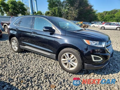Czwarte zdjęcie samochodu z boku: 2018 FORD EDGE SEL VIN:2FMPK4J99JBC21928 - miniatura