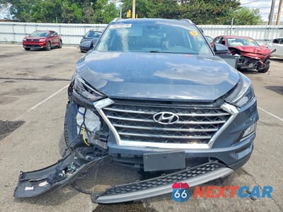 Piąte zdjęcie samochodu w środku: 2021 HYUNDAI TUCSON LIMITED VIN:KM8J33AL9MU285149 - miniatura