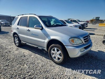 Czwarte zdjęcie samochodu z boku: 2004 MERCEDES-BENZ ML 500 VIN:4JGAB75E14A464969 - miniatura