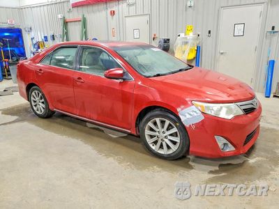 Czwarte zdjęcie samochodu z boku: 2014 TOYOTA CAMRY XLE VIN:4T4BF1FKXER385526 - miniatura