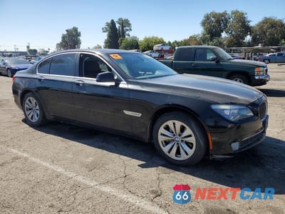 Czwarte zdjęcie samochodu z boku: 2011 BMW 740 I VIN:WBAKA4C52BC392241 - miniatura