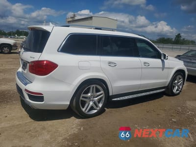 Trzecie zdjęcie samochodu z tyłu: 2015 MERCEDES-BENZ GL 550 4MATIC VIN:4JGDF7DE0FA448347 - miniatura