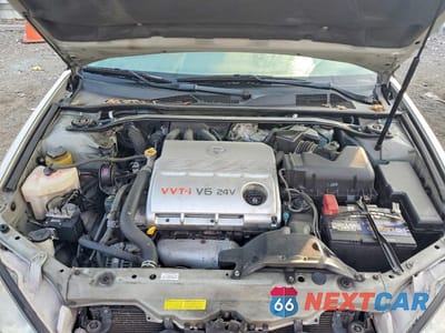 Zdjęcie 11 z 12 samochodu: 2004 TOYOTA CAMRY LE V6 VIN:4T1BF30K24U073830 - miniatura