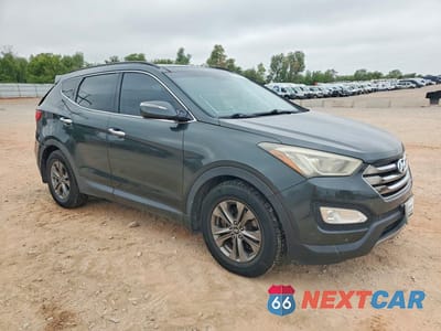 Czwarte zdjęcie samochodu z boku: 2014 HYUNDAI SANTA FE SPORT 2.4L VIN:5XYZU3LB4EG172088 - miniatura