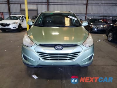 Piąte zdjęcie samochodu w środku: 2011 HYUNDAI TUCSON GLS VIN:KM8JU3AC9BU232056 - miniatura