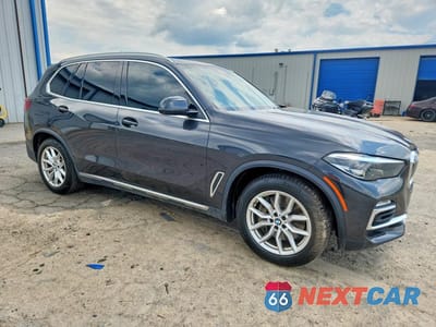 Czwarte zdjęcie samochodu z boku: 2021 BMW X5 XDRIVE45E VIN:5UXTA6C03M9G35774 - miniatura