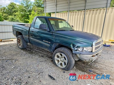 Czwarte zdjęcie samochodu z boku: 1999 DODGE RAM 1500 VIN:1B7HF16Y3XS272867 - miniatura