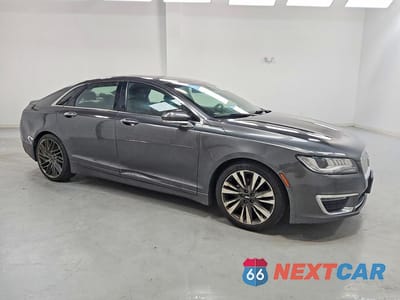 Czwarte zdjęcie samochodu z boku: 2019 LINCOLN MKZ RESERVE II VIN:3LN6L5F93KR605259 - miniatura