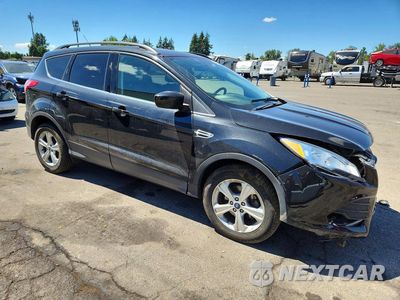 Czwarte zdjęcie samochodu z boku: 2014 FORD ESCAPE SE VIN:1FMCU0GX3EUD56698 - miniatura