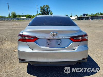 Zdjęcie 6 z 12 samochodu: 2021 TOYOTA CAMRY LE VIN:4T1C11AK4MU591704 - miniatura